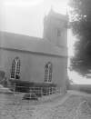 [Chapel, exterior 1926. Exterior of chapel showing tower and railings, large tree also visible. St Catherine's church was damaged by fire in 1922 and repaired and reopened in 1926.]