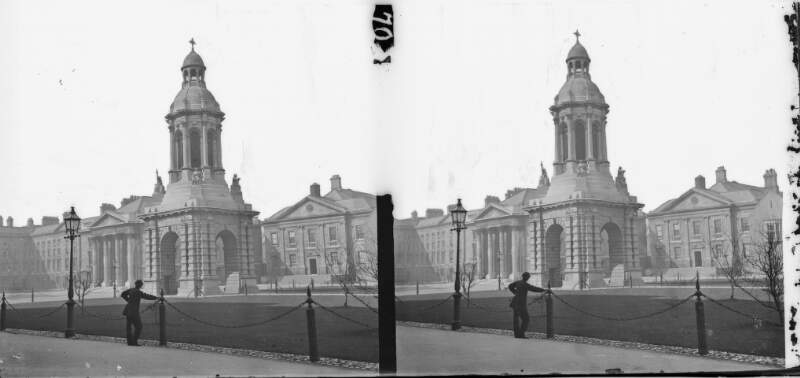 Campanile, Trinity College, man at chains in foreground, Dublin City, Co. Dublin