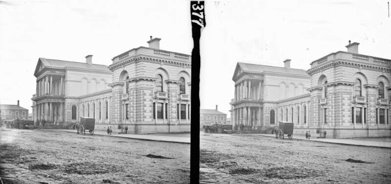 Possibly a railway Station, Covered cab, legend 'BNCR' & 'Northern Counties Railway' outside modern classical building Omnibus, Belfast, Co. Antrim