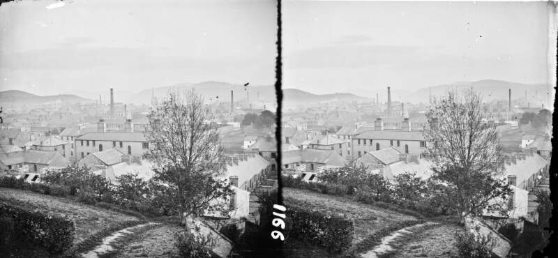 High angle, long shot, town, hills, in background, chimneys, spices, masts of ships, possibly in canal, Newry, Co. Down