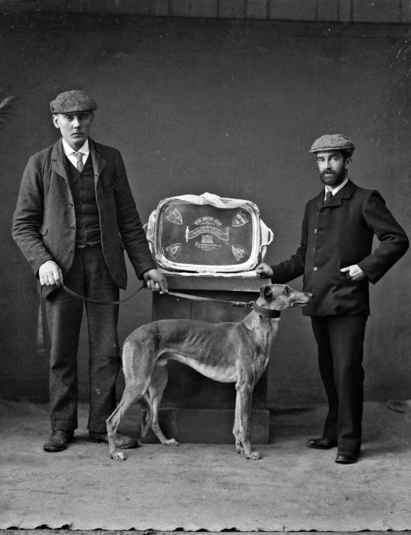 Two men, greyhound, Peerless de Wet and  and 1905 inaugural Irish Cup : commissioned by Mr. R.F. Phelan, Quay, Waterford