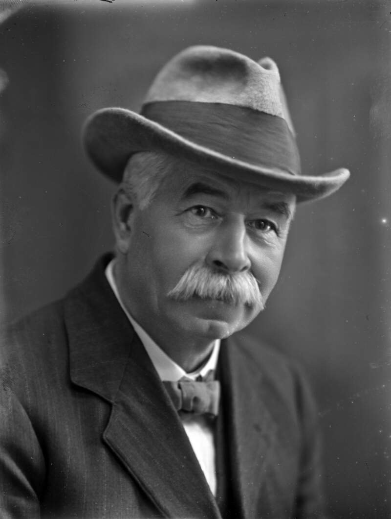 Mr. A.H. Poole with hat on