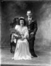 Mr. and Mrs. W. Smyth, 41, Michael Street, Waterford, wedding portrait with bride seated