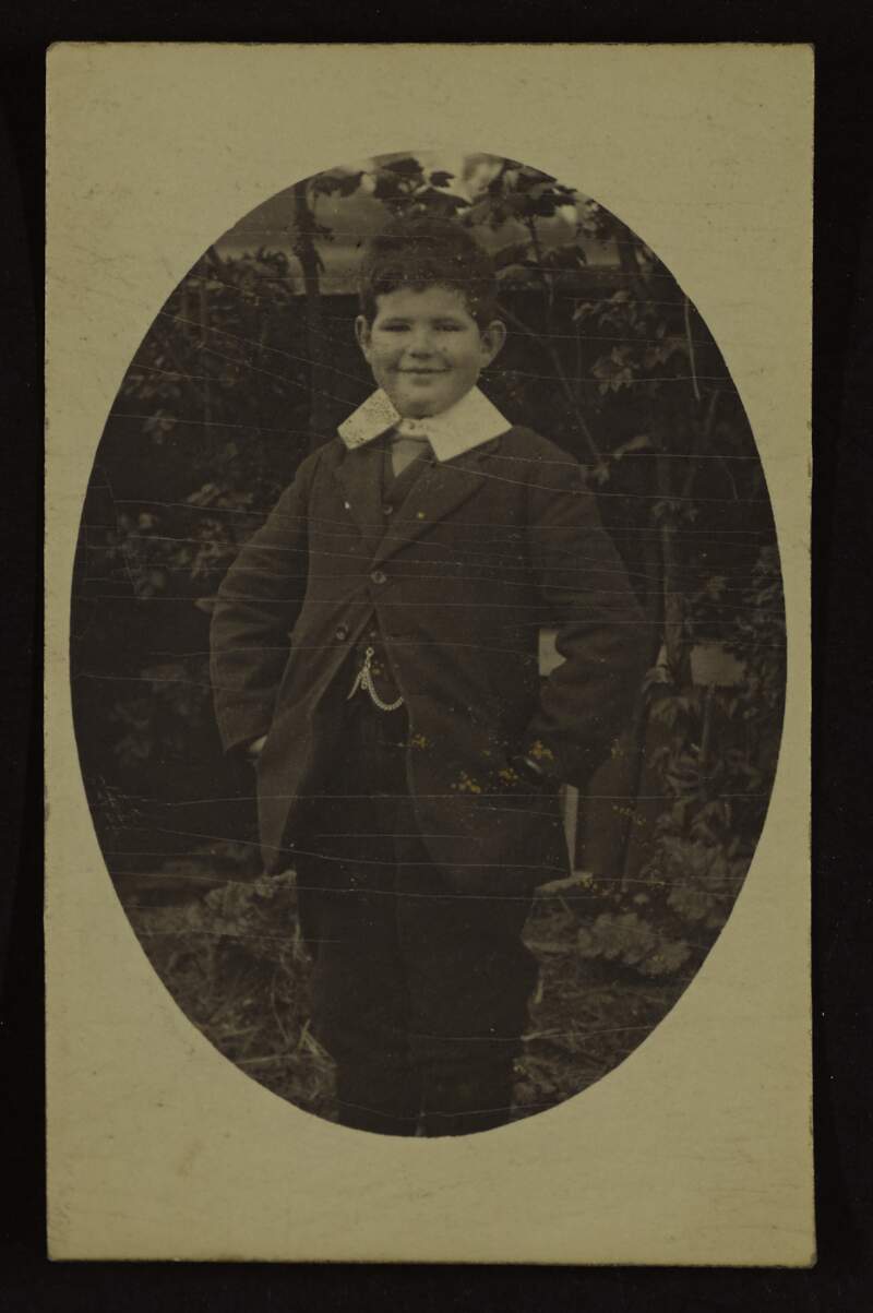 [Photographic portrait of a young Rónán Ceannt in formal attire],