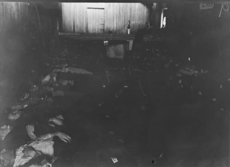 Lusitania disaster, Cobh, Co. Cork : bodies laid out, with numbered tags, in large room]