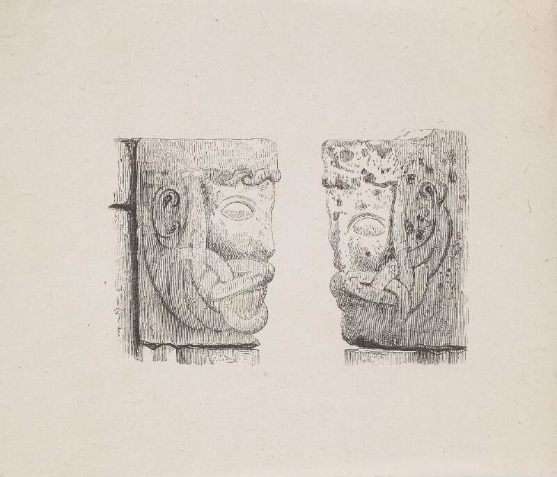 [Two stone faces - capital of a church pilaster]