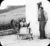 [Mrs Currane at spinning wheel with husband, Devenish Island, Lough Erne, Co. Fermanagh]