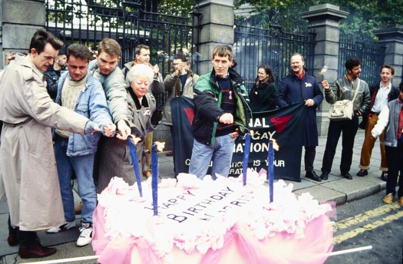 Cake with protestors including Phil Moore, Michael Dillon, George Rowbotham and Bill Foley. Anniversary of David Norris Decision in EU Court