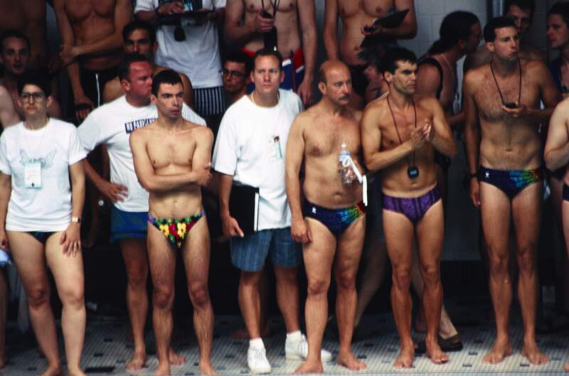 Swimming competitors at side of pool awaiting their turn. Gay Games New York