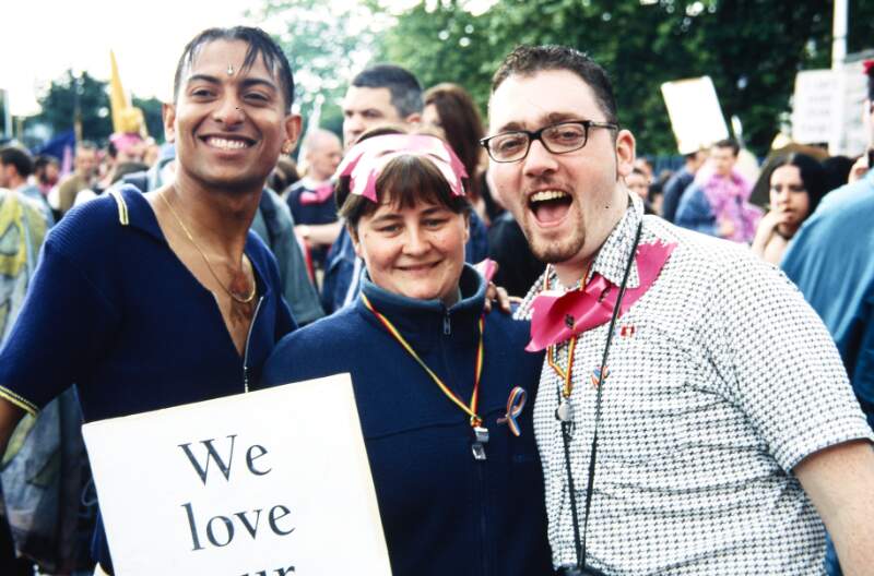 Close up of two men and one woman. Dublin Lesbian and Gay Pride March
