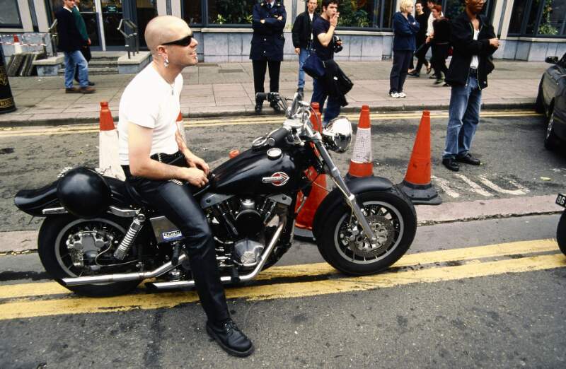 Close up of pierced man on Harley Davidson motorbike. Dublin Lesbian and Gay Pride March