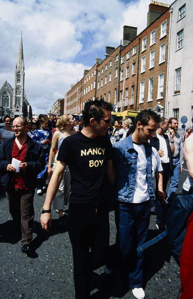Close up of marchers including man wearing "Nancy Boy" t-shirt. Dublin Lesbian and Gay Pride March