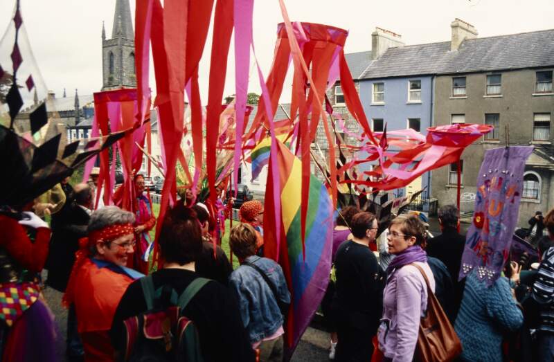 Section of rally under flags and streamers Sligo Lesbian Gay Bisexual and Transgendered Pride
