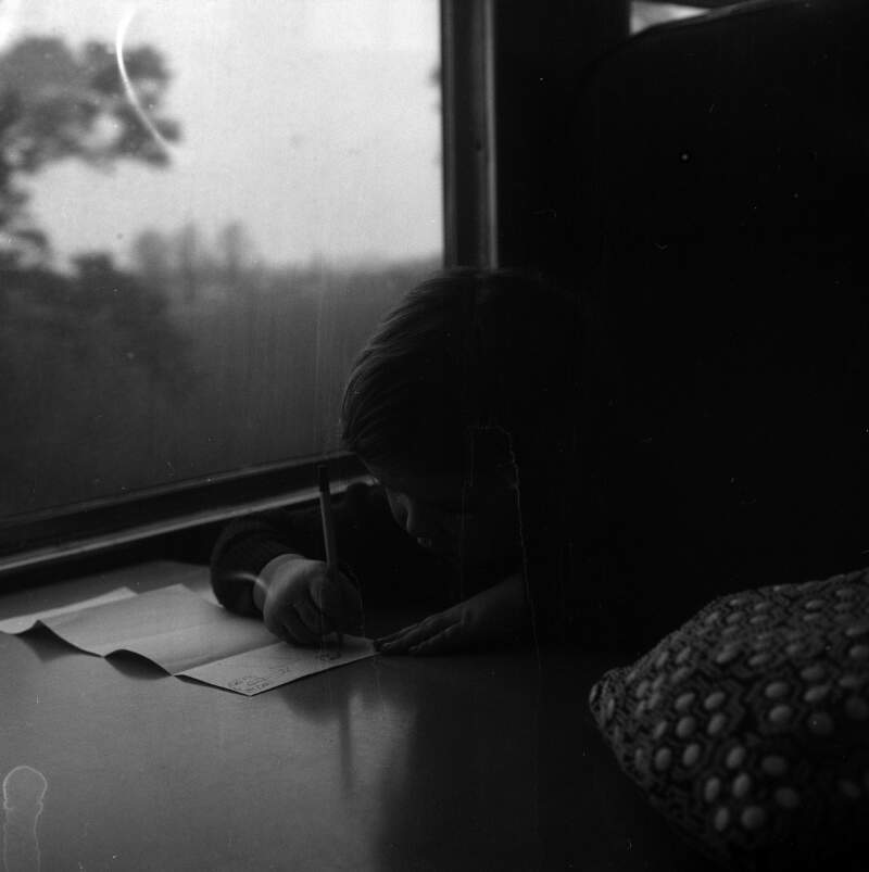 [Portrait, young girl on Mayo train]