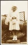 [Full length portrait of May McQuaid on her First Communion Day]