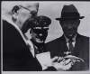 L/R Pres. of Ireland, O'Kelly is presented with the Key to the Capital as Pres. Eisenhower look's on